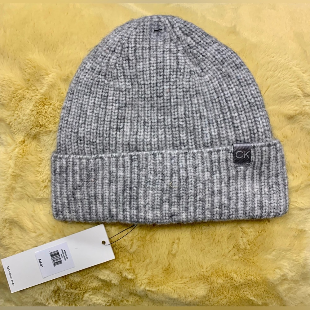 Grey knitted Calvin Klein soft beanie perfect for winter season and cold weather